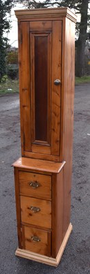 Lot 1720 - A pine narrow cabinet