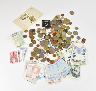 Lot 1601 - A small collection of assorted coins including...