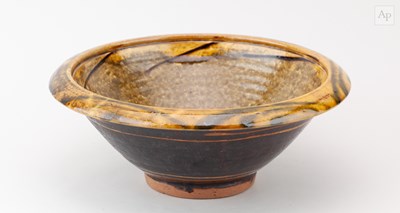 Lot 132 - CLIVE BOWEN (born 1943); a large slipware bowl...