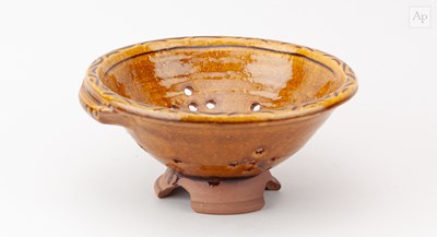 Lot 135 - CLIVE BOWEN (born 1943); a slipware colander...