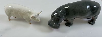 Lot 233 - BESWICK; a hippopotamus and a pig, which is...