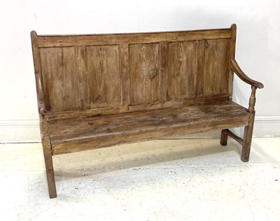 Lot 1076 - A 19th century provincial rustic pine settle,...