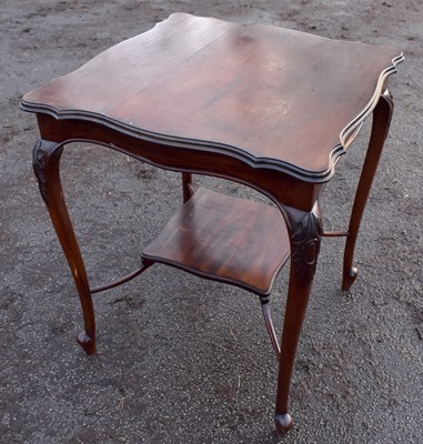 Lot 1635 - An Edwardian mahogany two tier occasional table