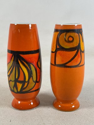 Lot 257 - POOLE POTTERY; two orange glazed 'Dephis'...