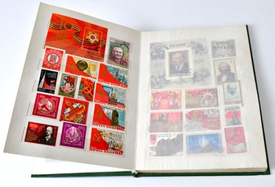 Lot 493 - A stamp book containing vintage Russian stamps...