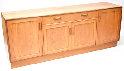 Lot 57 - G-PLAN; a mid-20th century teak sideboard,...