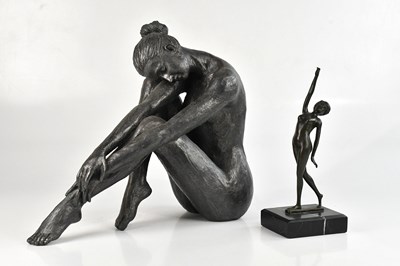 Lot 1344 - A decorative bronze model of a nude girl with...