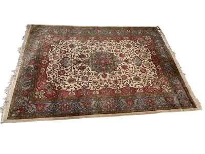 Lot 1211 - A cream ground Eastern style carpet with...