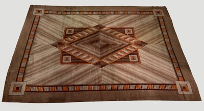 Lot 1158 - A mid century brown ground machined carpet...