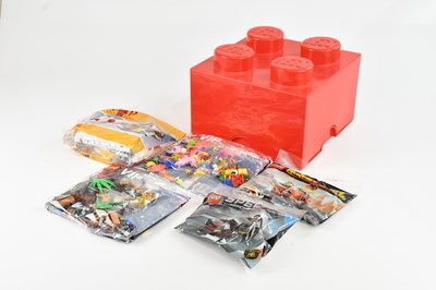 Lot 628 - LEGO; a small red LEGO cube box containing...