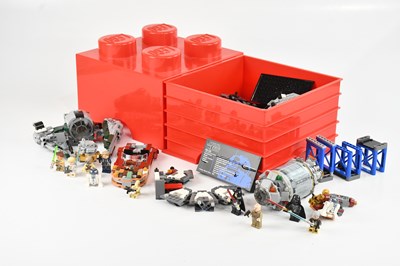 Lot 630 - LEGO; a small red cube storage box containing...