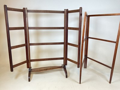 Lot 751 - Two early 20th century wooden folding towel...