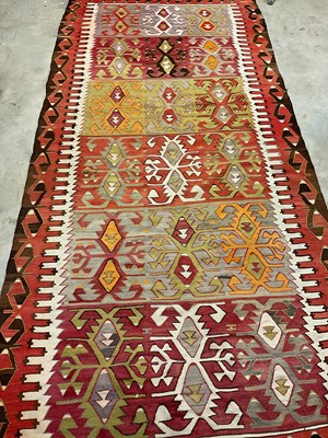 Lot 661 - A large vintage Turkish Kilim rug, 320 x 152cm.