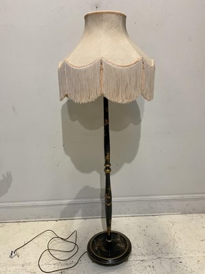 Lot 1319 - An ebonised standard lamp with Chinoiserie...