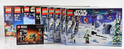 Lot 614 - LEGO; nine boxed model advent calendars...
