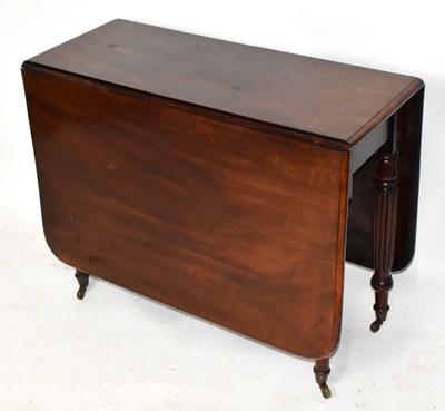 Lot 1577 - A 19th century mahogany rounded rectangular drop-leaf table