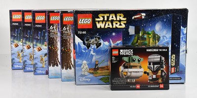 Lot 647 - LEGO; six boxed Star Wars advent calendar sets...