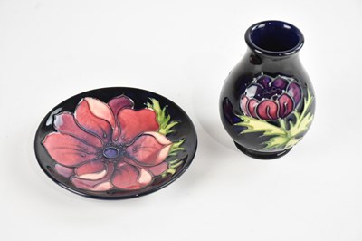 Lot 296 - MOORCROFT; a decorative baluster shaped vase,...