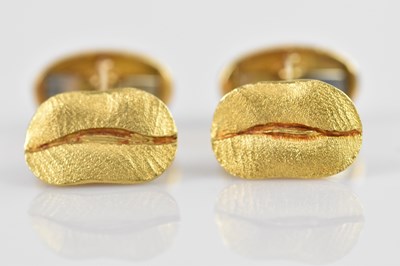Lot 218 - A pair of yellow metal coffee bean/dollar...