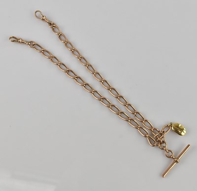 Lot 290 - A 9ct rose gold oval link Albert chain with...