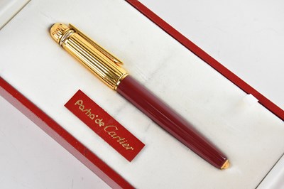 Lot 1172 - PASHA DE CARTIER; an ink  pen with 18K nib,...