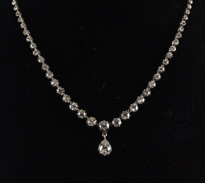 Lot 1329 - An antique diamond rivière necklace with...