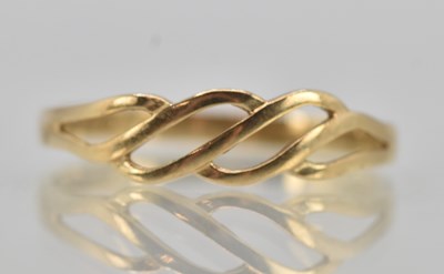 Lot 1322 - A 9ct yellow gold dress ring with diagonal...