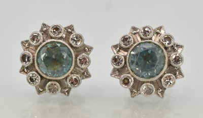 Lot 1410 - A pair of aquamarine and diamond set stud...