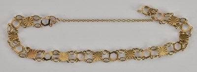 Lot 1464 - A 9ct yellow gold flat link bracelet, with...