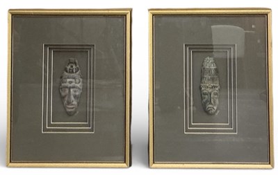 Lot 560 - A pair of framed Canadian Inuit tribal carved...