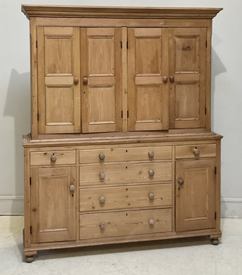 Lot 1043 - A pine housekeeper's cupboard, with four...
