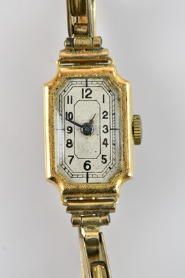 Lot 1579 - A lady's 9ct gold wristwatch, the dial with...