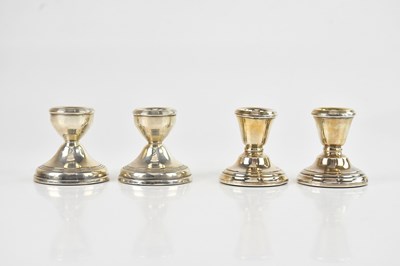 Lot 1527 - Two pairs of hallmarked silver dwarf...