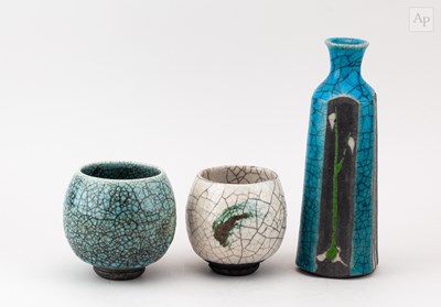 Lot 557 - SIMON LEACH (born 1956); a faceted raku bottle...