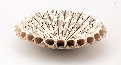 Lot 375 - LISA ELLUL; an earthenware 'Spotty Leaf Cone...