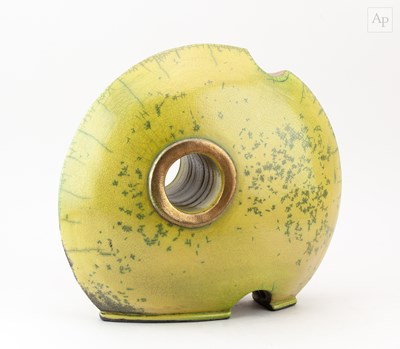 Lot 710 - WENDY JOHNSON; a large pierced raku disc form...