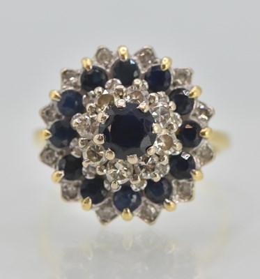 Lot 1213 - An 18ct yellow gold diamond and sapphire set...