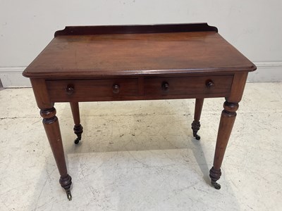 Lot 1117 - A Victorian mahogany side table, with two...