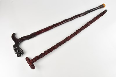 Lot 375 - A modern Chinese carved and stained hardwood...