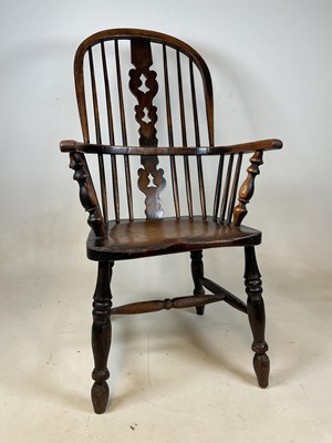 Lot 693 - A 19th century Windsor high back arm bow chair...