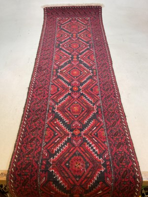 Lot 655 - A Balouch runner, 100% wool pile, hand woven...