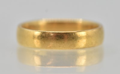 Lot 1212 - An 18ct yellow gold band ring, size N, approx...