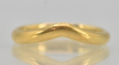 Lot 1224 - An 18ct yellow gold wishbone ring, size O,...