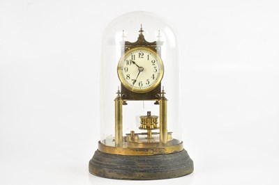Lot 1283 - BHA; a brass suspension clock, with white...