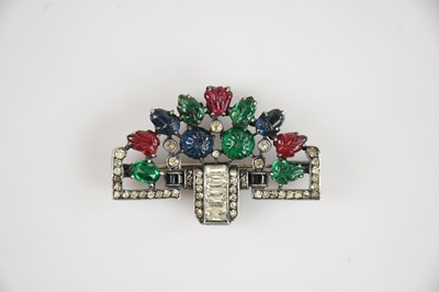 Lot 778 - An Art Deco style floral brooch formed as a...