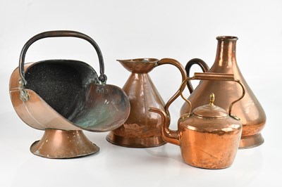 Lot 1357 - A two gallon copper measuring jug, height 38cm,...
