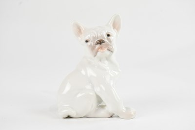 Lot 220 - BING & GRONDAHL; a model of a seated French...