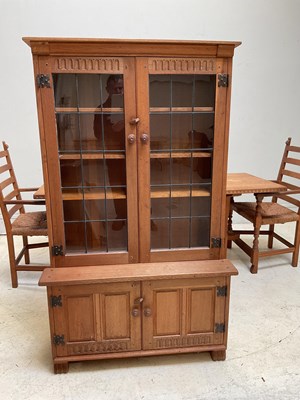 Lot 1057 - RUPERT GRIFFITHS; an oak dining table, height...