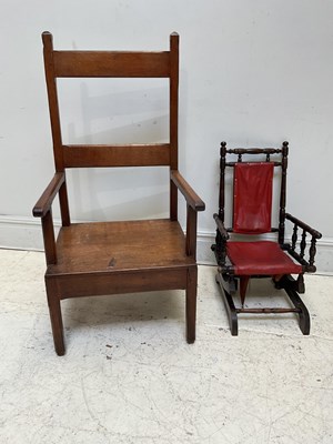 Lot 1108 - An Arts and Crafts oak elbow chair, height...