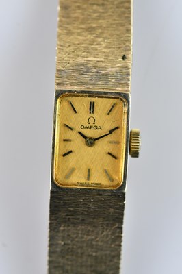 Lot 1027 - OMEGA; a lady's 9ct gold wristwatch, the dial...